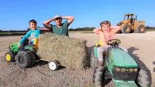 Using kids tractors to move hay and rocks on the farm | Tractors for kids