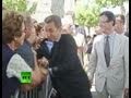 SARKOZY attack video: Man grabs French prez.
