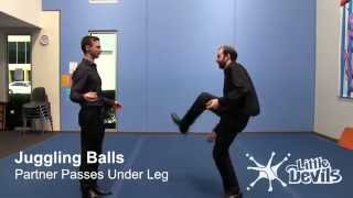 JUGGLING BALLS - Partner Passes Under Leg