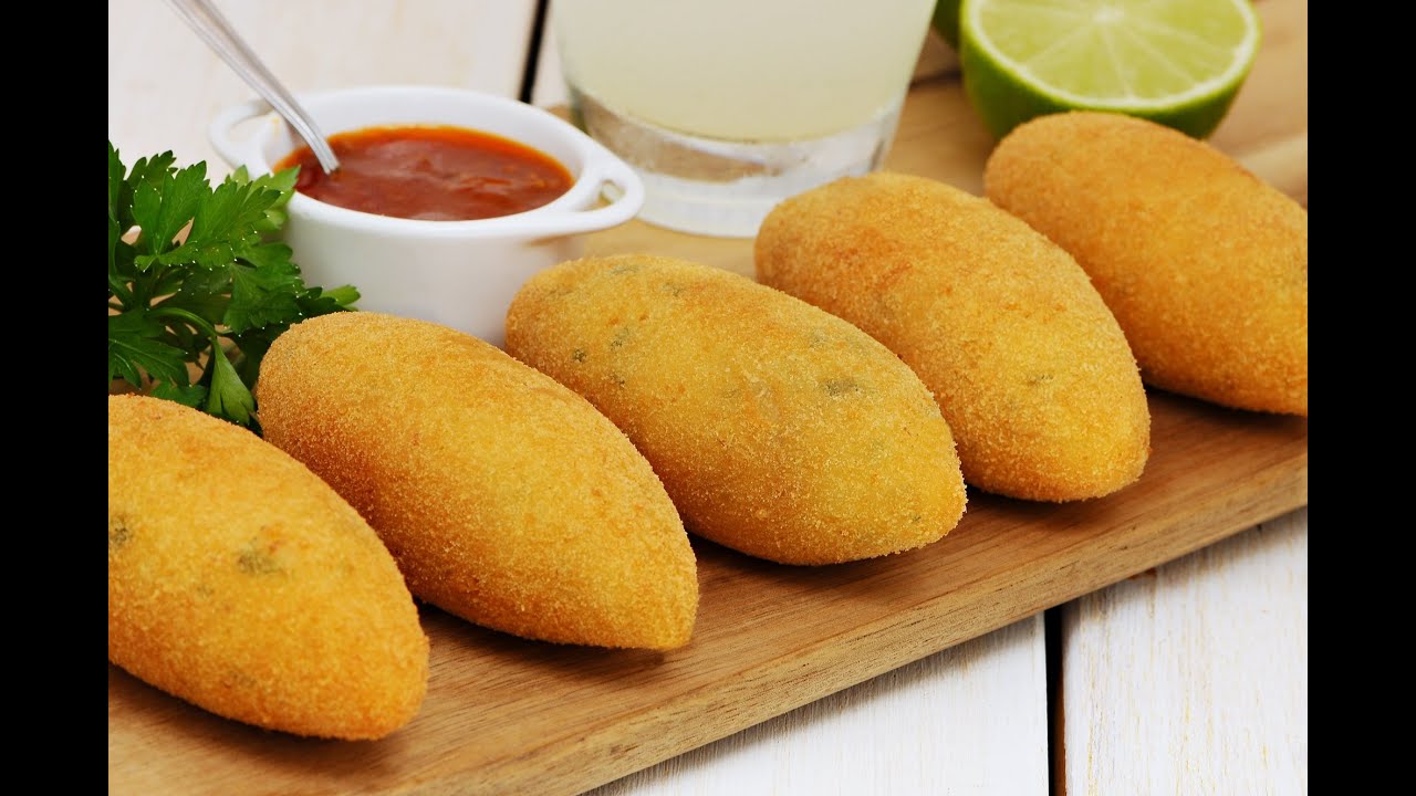 UM DOS MELHORES SALGADOS DO MUNDO!  APRENDA A MINHA RECEITA CAMPEÃ DE BOLINHO DE AIPIM RECHEADO