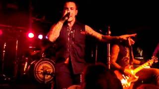 Rev Theory - Dead In A Grave
