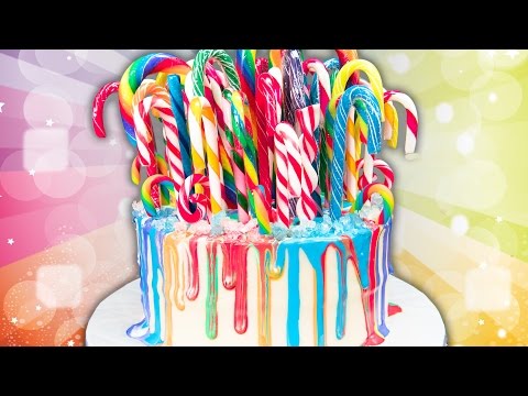Rainbow Drip Candy Cane Cake  (Christmas Cake) from Cookies Cupcakes and Cardio