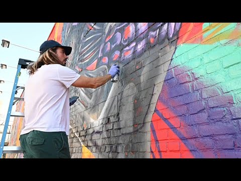 Artist MADSTEEZ honors release of new 'Terminator' film with giant mural | AFP