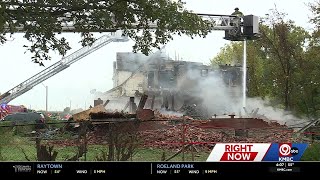 Investigation into fire that destroyed vacant apartment building, damaged other homes