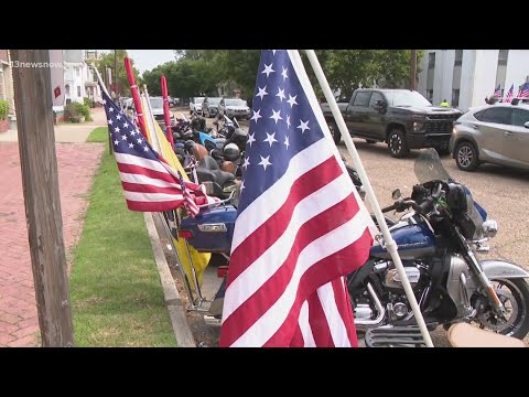 Patriot Guard Riders honor Navy sailor with flags at funeral