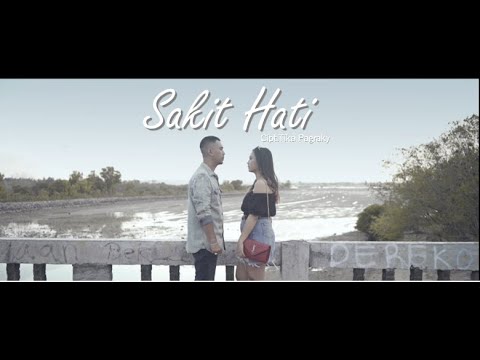 TIKA PAGRAKY - SAKIT HATI ( Official Clip Video )