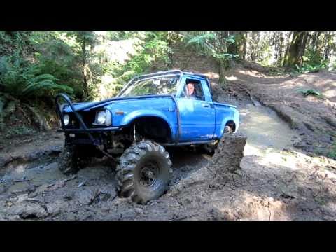 Sick Toyota on 36" Tractor Tires going through mudhole