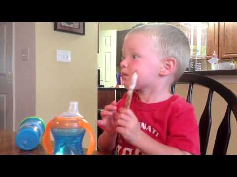 Simi and Zeke eating choco pretzel 2