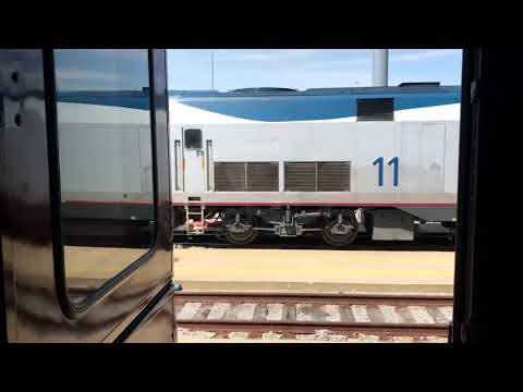 A view of some Amtrak P42DC locomotives from the porch of the Colonial Crafts passenger car