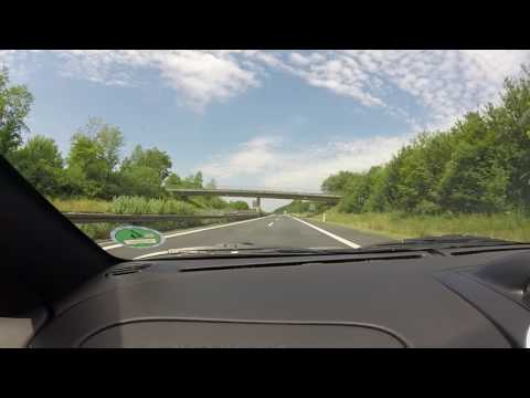 Audi R8 passing Holden Monaro at high speed