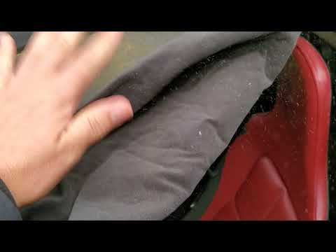 Damaged Tesla roadster soft top on a lotus Elise.