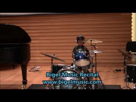 Tampa Music Center Drum Lesson Student Performing Top of The World