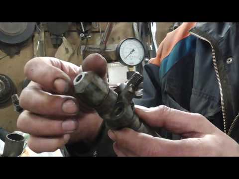 MF165, osa 22 , suuttimien painesäätöä