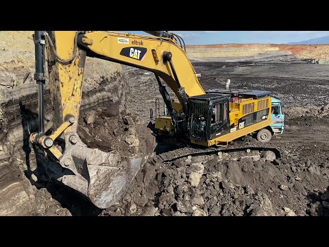 Caterpillar 390D Excavator Loading Mercedes & MAN Trucks With Two Passes - Interkat SA