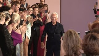 Models and designer on the runway for the Giorgio Armani Prive in Paris