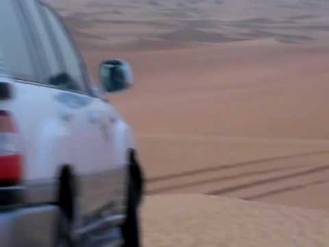 H2 and Land Cruiser in the dunes of Dubai