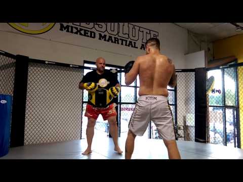 Brock Jardine Hitting pads with Professor Rob