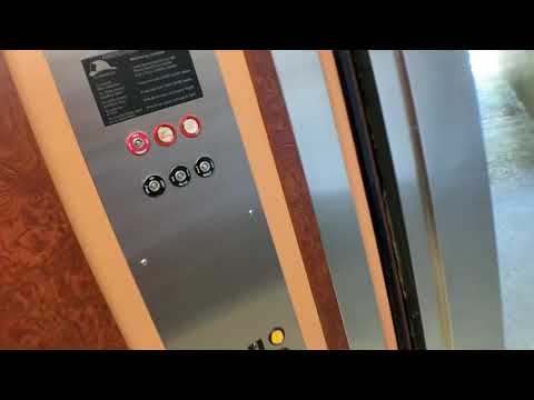 Tastefully Modernized Hydraulic Elevator At The Crossroads Condo Office Building In WPB FL