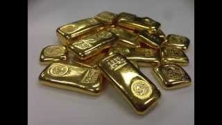 GOLD AND SILVER REVIEWED