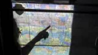 Merch Bot maps and silhouetted man