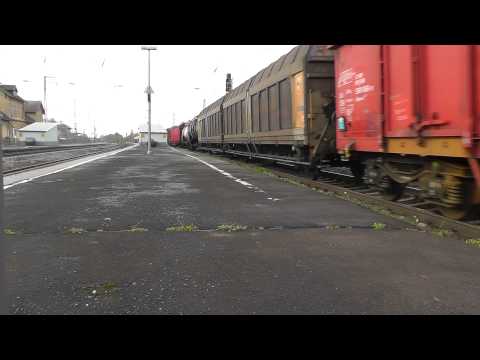BR 155 Railion with a mixed freight train in the station Brackwede