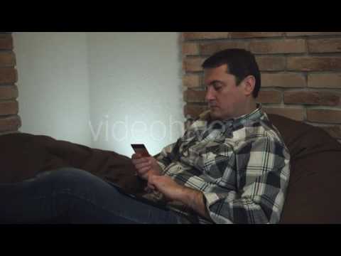 Attractive Man Making Credit Card Purchases. - Stock Footage | VideoHive 15132151