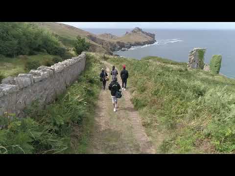 cornwall drone shot with mountans and beach