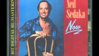 Neil Sedaka - "Love Is Spreading Over The World" (1981)