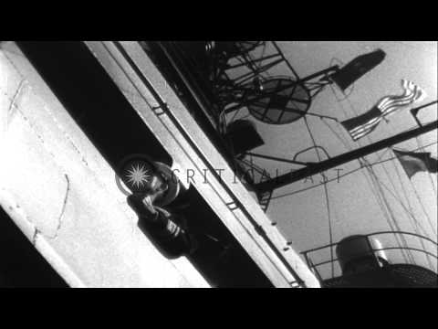 A catapult officer gives a go signal to a US Navy Douglas AD Skyraider to be laun...HD Stock Footage