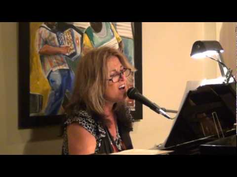 "I Turn to You" performed by Sharyn Scott.