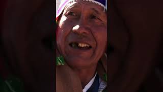 This shaman invokes spirits to protect truck drivers and their vehicles.