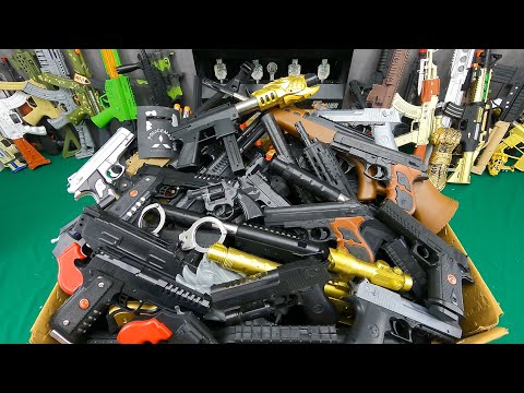 Box of Toy Realistic Black Color Guns, Bead Shooter And Capsule Explosion Guns