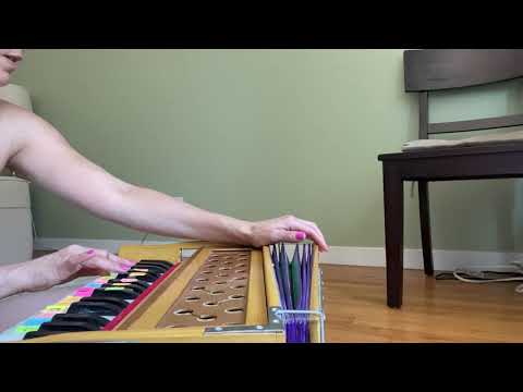 Invocation mantras on the harmonium