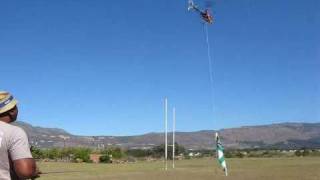 preview picture of video 'TREX 600 ESP towing a South African Navy flag (10/04/2011)'