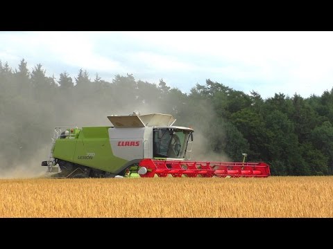 Claas Lexion 770 TT mit Vario 1200 und Fendt 936 mit Hawe Überladewagen bei der Getreideernte 2015