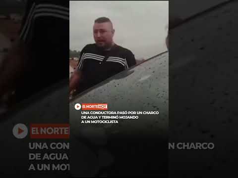 ¡Motociclista enfureció porque una conductora lo mojó!