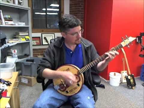 A Short Unscripted Demo of Two C. B. Gitty Advertising Tin Guitars