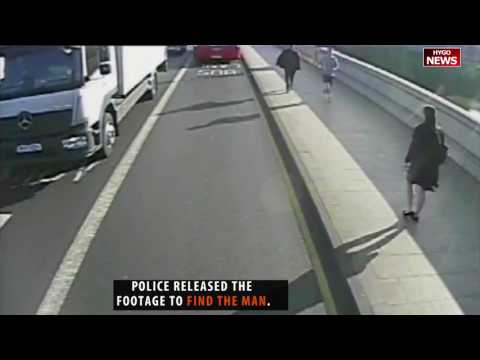 This jogger shoved a woman into the path of an oncoming bus on Putney Bridge, in London.