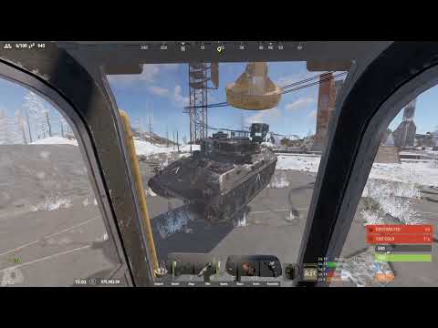 Magnet crane Bradley tank in rust