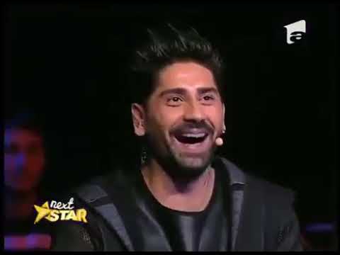 Emily Moskalenko, număr spectaculos de acrobație la bară.mp4