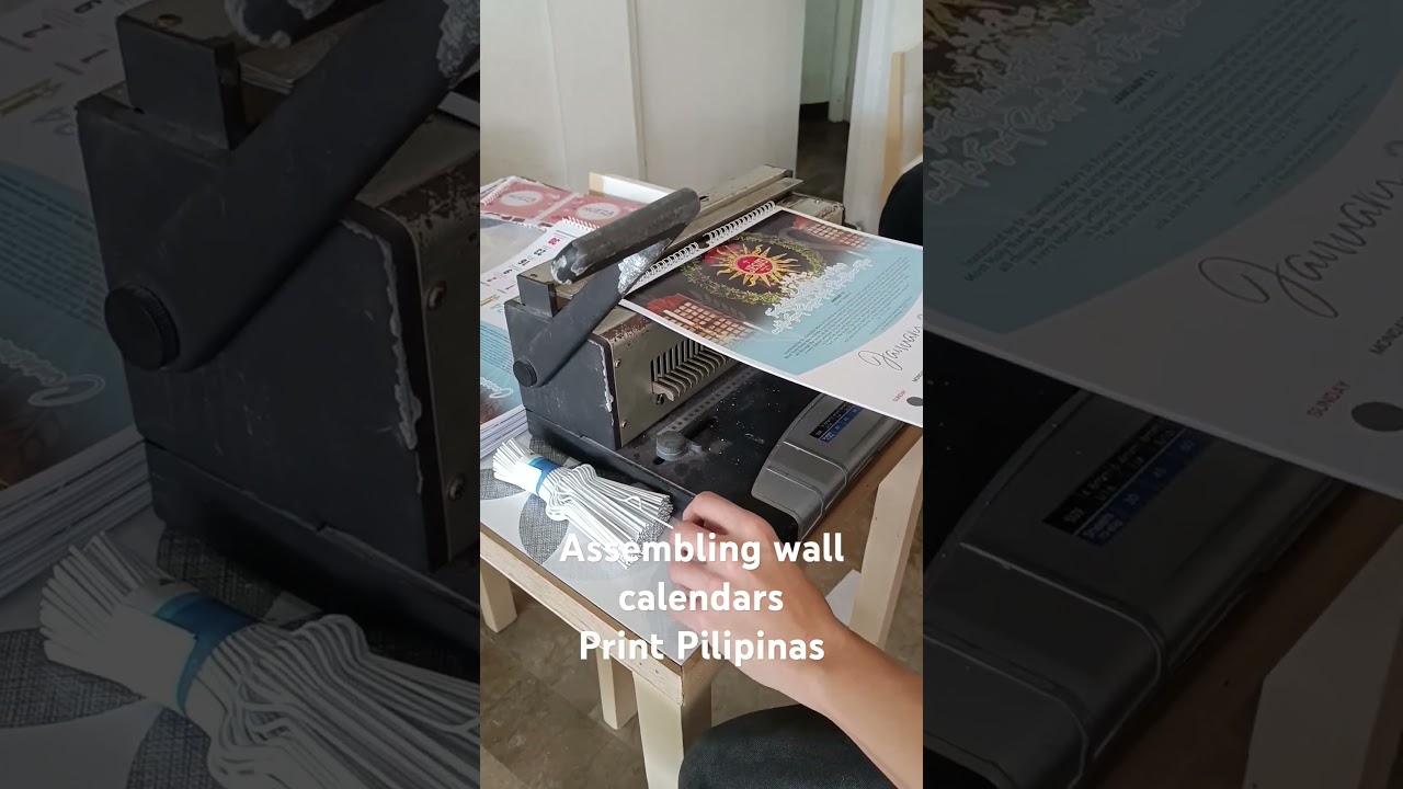 Assembling wall calendars by Print Pilipinas