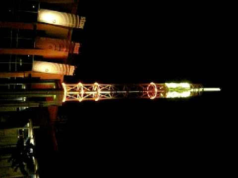 The rebuilt tower at STAX in Memphis lit at night.