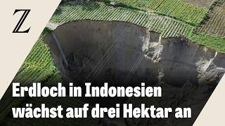 Download lagu Indonesien: Riesiges Erdloch verschlingt Anbaufelder von Bauern mp3