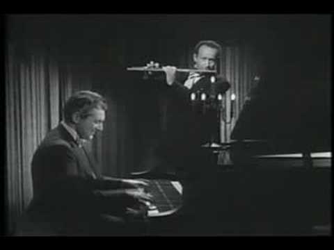 Liberace performing April in Portugal