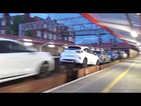 Very rare fast train trhough Crewe station Down Slow line platform, Britain