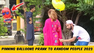 Pinning balloons to strangers | random people Prank @FahadDean