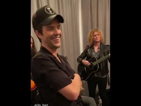 The Killers playing an acoustic set backstage at NYC Homecoming