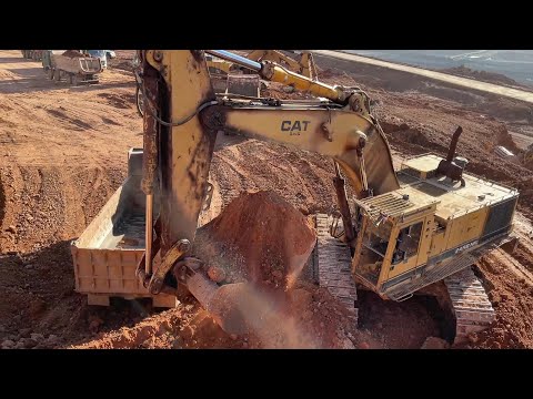 Caterpillar 245 Excavator Loading Mercedes & MAN Trucks