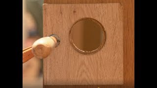 How to enlarge a hole for a door handle