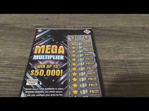 Scratching off a $5 Mega Multiplier Scratch off from DC.